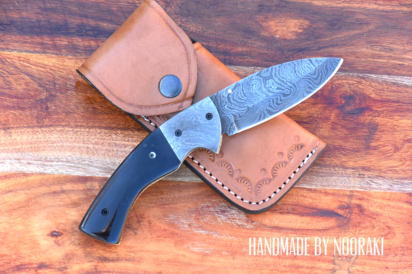 Crafted Custom Damascus Steel Folding Knife - Exquisite Buffalo Horn Handle and Complimentary Sheath